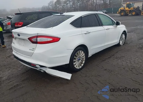 2013 Ford Fusion Hybrid Se z USA, uszkodzony, nr VIN 3FA6P0LU1DR328768